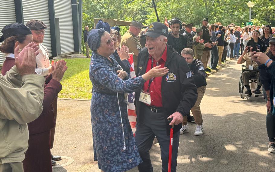 A welcoming committee for American World War II veterans, including Don Graves, was arranged by citizens of the Normandy commune of Houlgate, France. It included men dressed in WWII U.S. uniforms, some women in 1940s fashion and schoolchildren. The commune also provided the veterans, who passed through on Monday, June 3, 2024, with lunch in a community gym. 