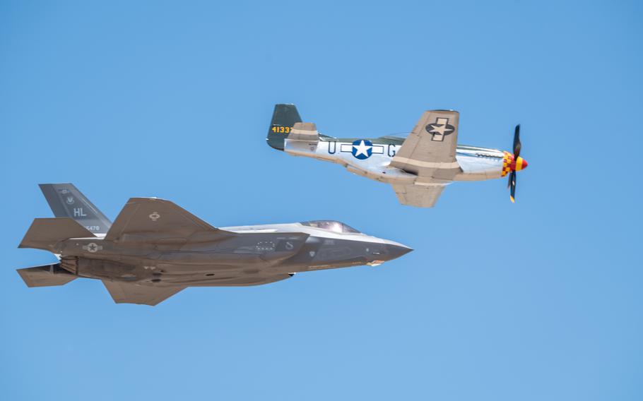 A P-51 Mustang performs a flyover alongside an F-35 Lightning II as part of a heritage demonstration during the Warriors over the Wasatch air show at Hill Air Force Base, Utah, June 29, 2024.