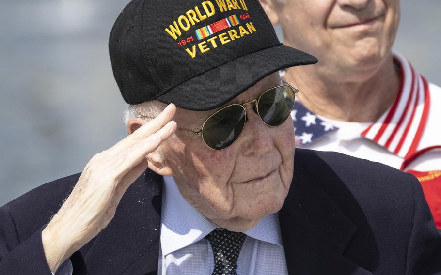 World War II veteran Jeffrey Donahue salutes during the 20th anniversary celebration of the National World War II Memorial in Washington, May 25, 2024.