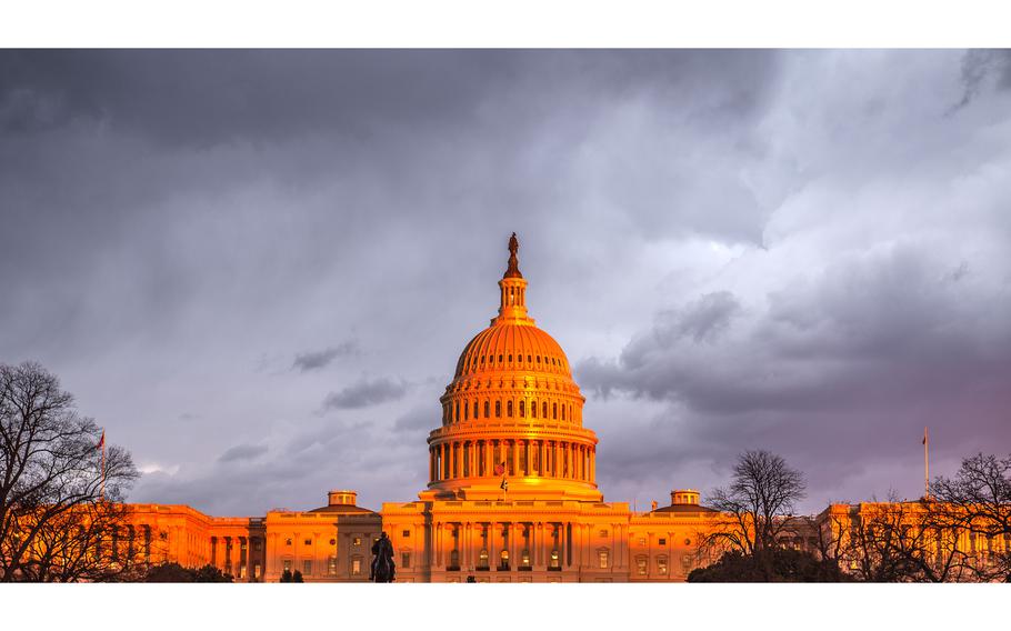 The U.S. Capitol reflects the setting sun in Washington, D.C., on Dec. 5, 2019, as dark clouds pass overhead. A bipartisan group of lawmakers — led by Minnesota Democrat Amy Klobuchar, who chairs the Senate Rules and Administration Committee, and which also includes Sens. Josh Hawley, R-Mo.; Chris Coons, D-Del.; Susan Collins, R-Maine; Pete Ricketts, R-Neb.; and Michael Bennet, D-Colo. — proposed legislation last month that would ban the “distribution of materially deceptive AI-generated audio or visual media” about individuals seeking federal office.