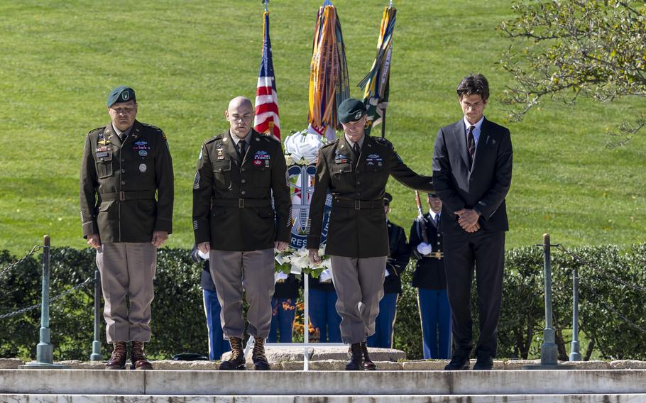 Several members of the U.S. Army’s 1st Special Forces Command (Airborne) and the grandson of President John F. Kennedy return from laying a wreath at Arlington National Cemetery in Arlington, Va. 