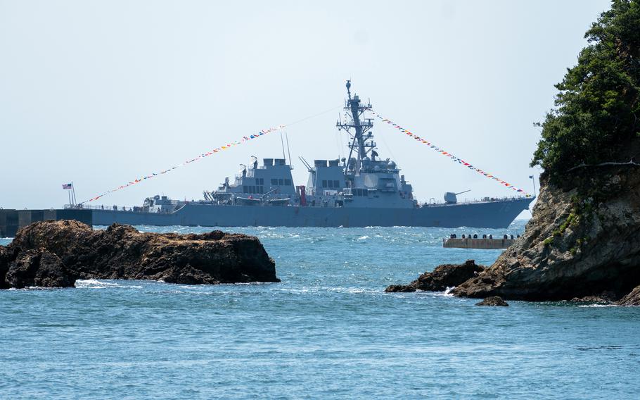 The guided-missile destroyer USS Higgins anchors off Shimoda, Japan, May 17, 2024, for the 85th annual Black Ship Festival.