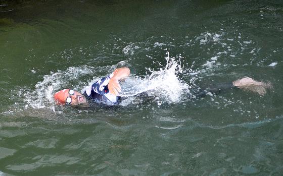 Army Ranger and Golden Knight veteran Howie Sanborn swims in the River Seine on Sept. 2, 2024, during the men's PTWC triathlon at the 2024 Paralympic Games in Paris. Sanborn finished ninth after a crash during the running portion.