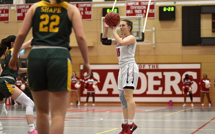 Kaiserslautern's Elizabeth Marriott shoots during a Jan. 12, 2024, game against SHAPE at Kaiserslautern High School in Kaiserslautern, Germany.