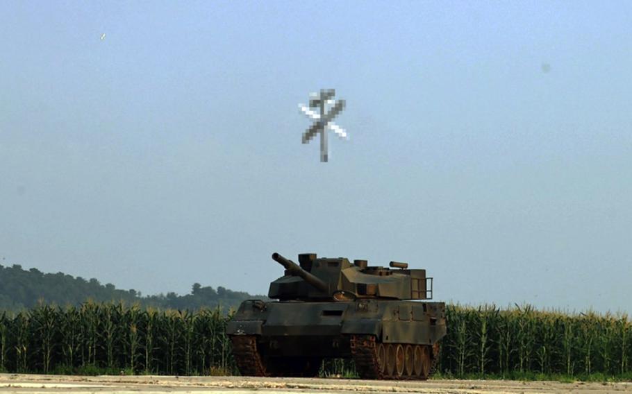 A North Korean drone attacks a target at an unknown location. This doctored image was released by the state-run Korean Central News Agency on August 26, 2024.