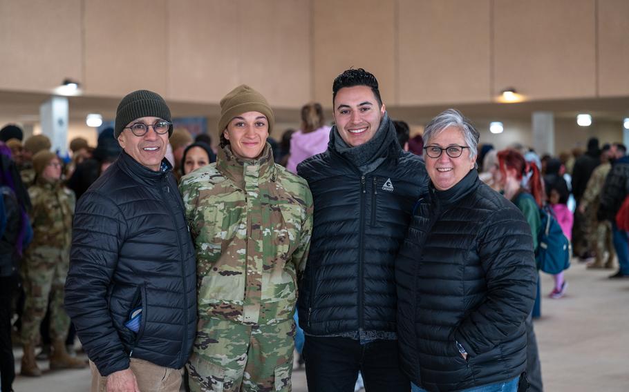 Airman Anita Alvarez smiles with her family