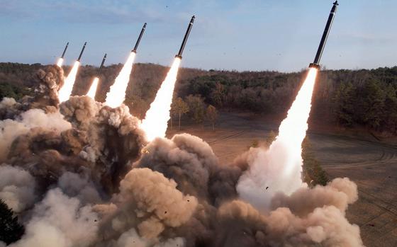 North Korea tests a multiple launch rocket system.