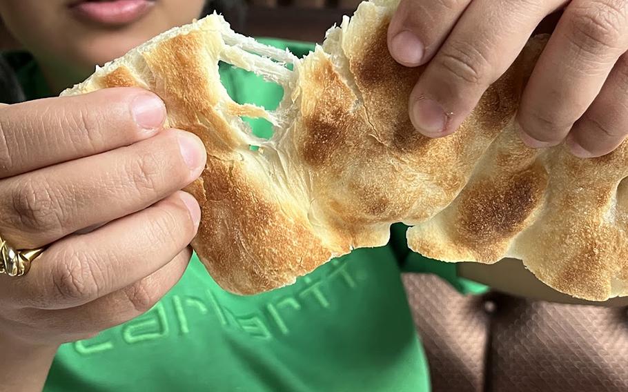 The Afghan-style flatbread at Miami Food is fluffy and stretchy on the inside, crunchy on the outside.