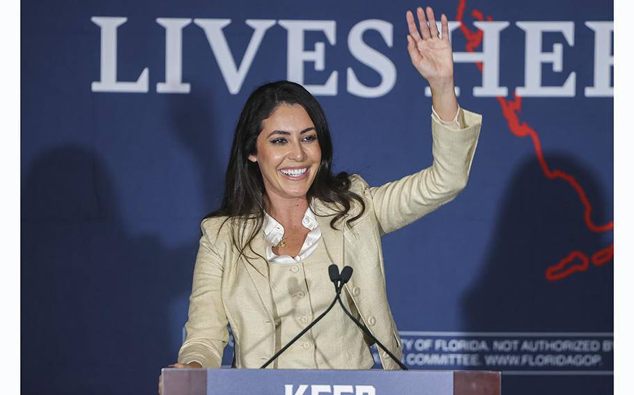 Anna Paulina Luna, an Air Force veteran, speaks to a crowd during the Keep Florida Free Tour on Aug. 24, 2022, in Tampa.