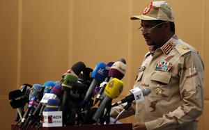 FILE -Gen. Mohammed Hamdan Dagalo, the deputy head of the military council speaks at a ceremony in the capital Khartoum, Sudan, Sunday, Aug. 4, 2019. Sudan's paramilitary leader has announced plans to attend ceasefire talks in Switzerland next month arranged by the United States and Saudi Arabia. (AP Photo, File)