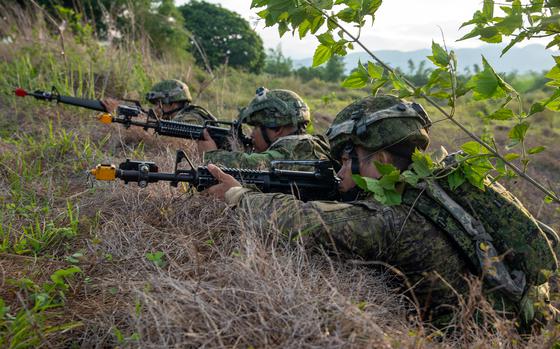 Philippines soldiers with the 7th Infantry Division scan the horizon for enemy forces during an air assault maneuver as part of the Joint Pacific Multinational Readiness Center-Exportable exercise on Fort Magsaysay, Philippines, on June 1, 2024. 