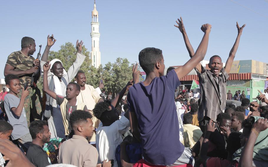 People celebrate following the reports that, Sudan’s army had entered the central city of Wad Madani and pushed out its paramilitary rivals the Rapid Support Forces (RSF), in Merowe, Sudan, Saturday, Jan.11, 2025. 