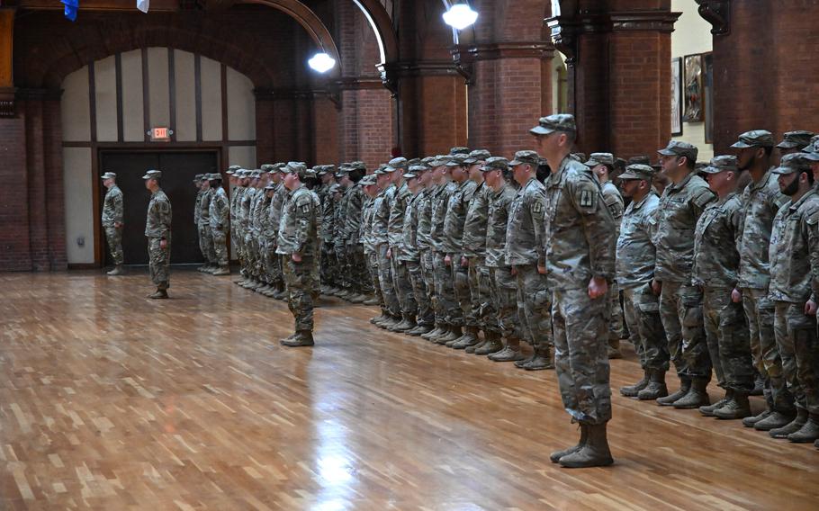 Soldiers stand in formation