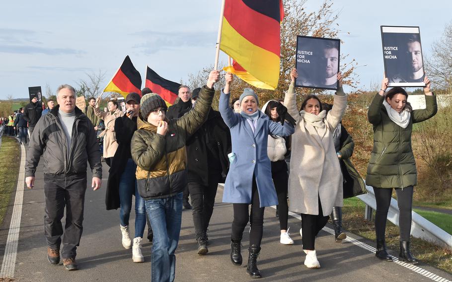 People protest outside a U.S. Air Force base in Germany.