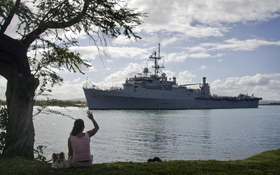 The amphibious transport dock ship USS Cleveland departs Joint Base Pearl Harbor-Hickam on its final deployment on July 27, 2011.