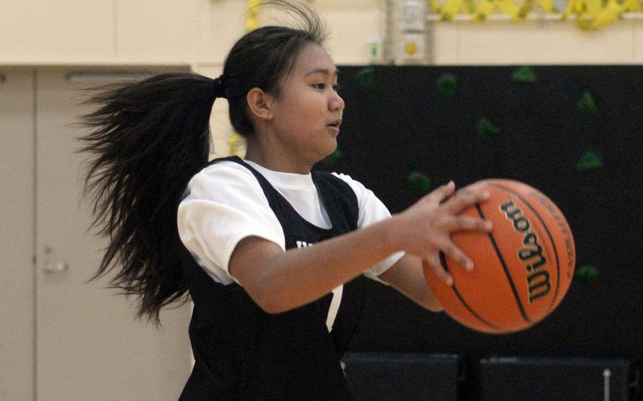 Jazlene Vergara practices in basketball.