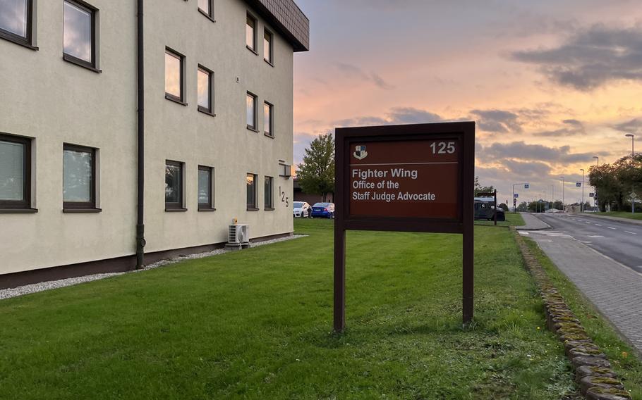 A sign for the Air Force courthouse at sunset.