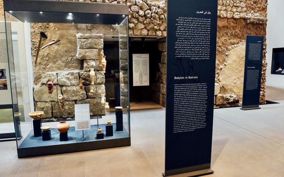 Artifacts are on display in glass cases at the Qal’at al-Bahrain museum. The museum consists of five exhibition halls showcasing over 500 artifacts found at the Bahrain Fort, including many restored rare ceramic pieces like the ones on display here.