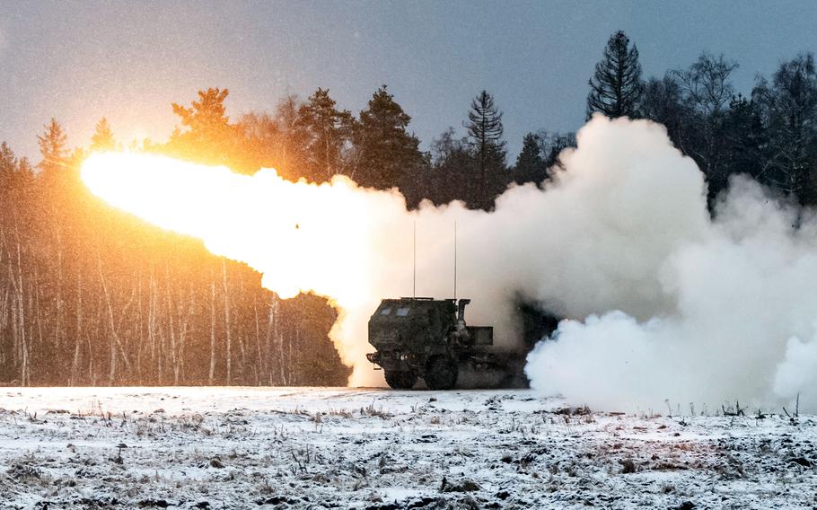 A HIMARS fires a test rocket in a snowy field.