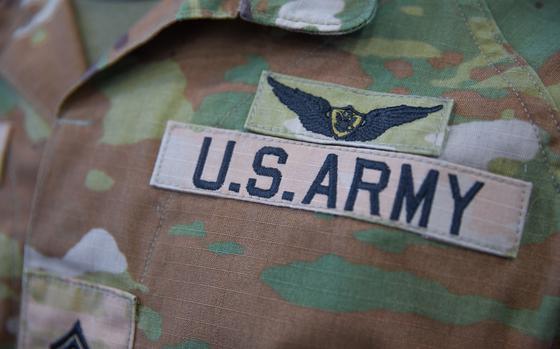 A U.S. Army soldier assigned to the 1109th Theater Aviation Support Maintenance Group, Connecticut Army National Guard, wears the Army Aviation Badge on their Improved Hot Weather Combat Uniform at the 1109th Theater Aviation Support Maintenance Group, Groton, Connecticut, April 21, 2023. The Army Aviation Badge, first authorized in 1947, is awarded to all soldiers on flight status who are part of an aircrew, and soldiers who are not part of an aircrew but support flight operations. (U.S. Army photo by Sgt. Matthew Lucibello)