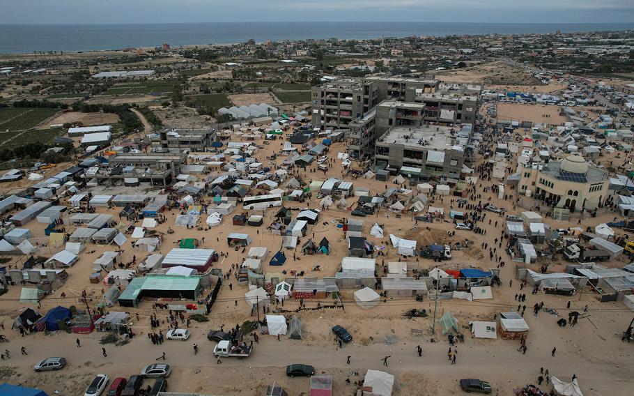 Displaced Palestinian families live in tents in the al-Mawasi area of Rafah in the Gaza Strip. 