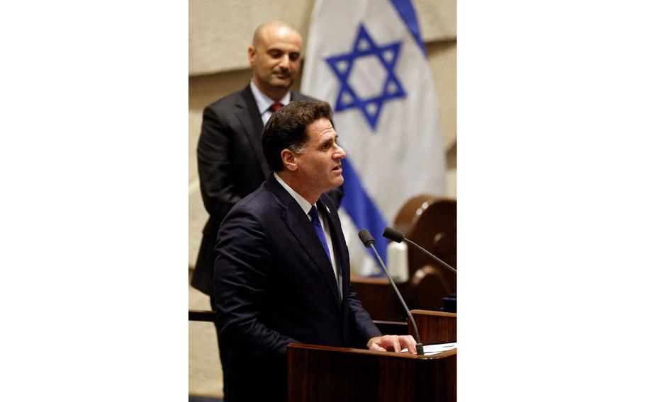 Former Israeli ambassador to the U.S. and new Minister for Strategic Affairs Ron Dermer addresses the Knesset (parliament) as the new government is sworn in, in Jerusalem, Dec. 29, 2022.