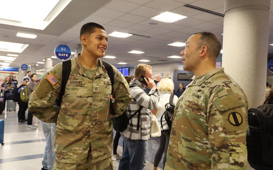 Sgt. Maj. Raymond Harris talks with a soldier 