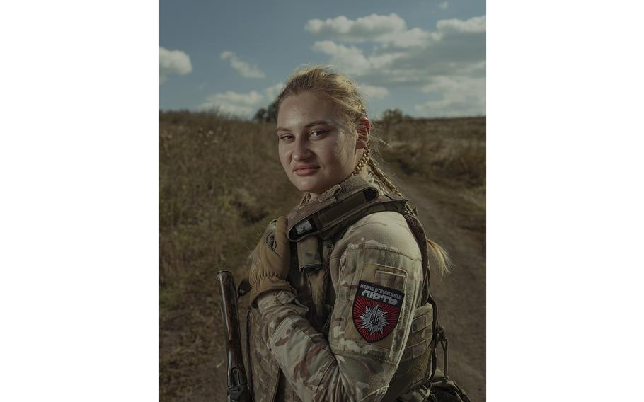 Alyona, whose call sign is Panthera, served four years as a K-9 police officer in the city of Vinnytsia but now is helping Ukraine troops storm Russian positions in the eastern part of the country. 