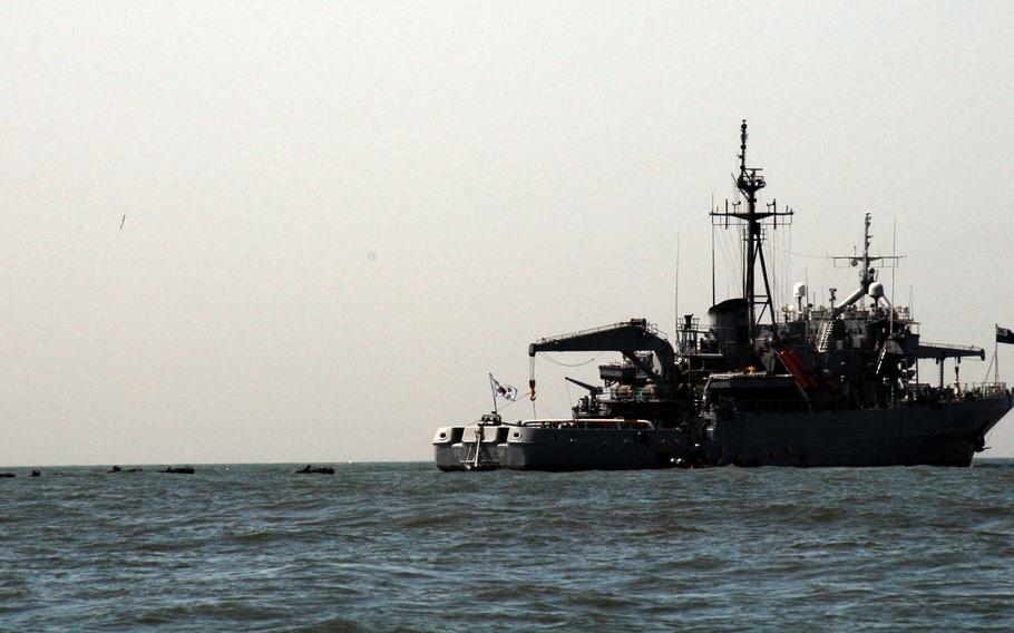 A South Korean salvage ship works over the site April 3, 2010, where the South Korean patrol ship Cheonan sank March 26. 