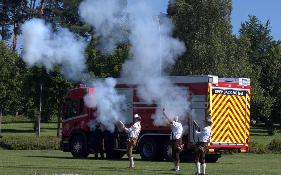 German army black powder shooters fire a volley during a U.S. Army change of command ceremony at Tower Barracks in Grafenwoehr, Germany, on Aug. 6, 2024. 