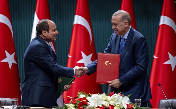 Turkish President Recep Tayyip Erdogan, right, shakes hands with Egyptian President Abdel Fattah el-Sissi during a bilateral signature agreements ceremony at the Presidential palace in Ankara, Wednesday, Sept. 4, 2024. (AP Photo/Francisco Seco)