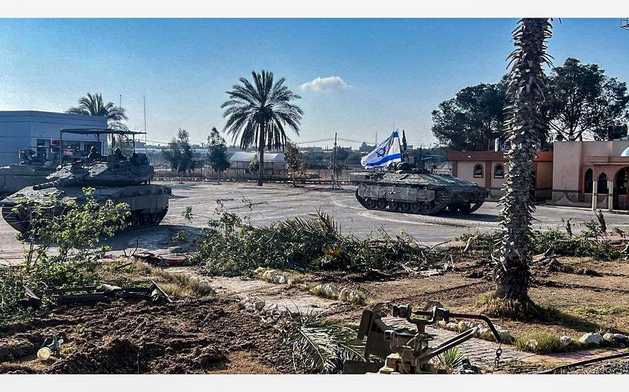 Israeli military vehicles operate in the Gazan side of the Rafah Crossing on May 7, 2024. 