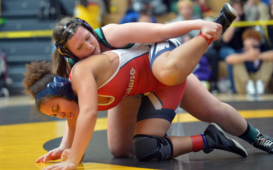 Audrey Pounds controls Angelisse Griffin.