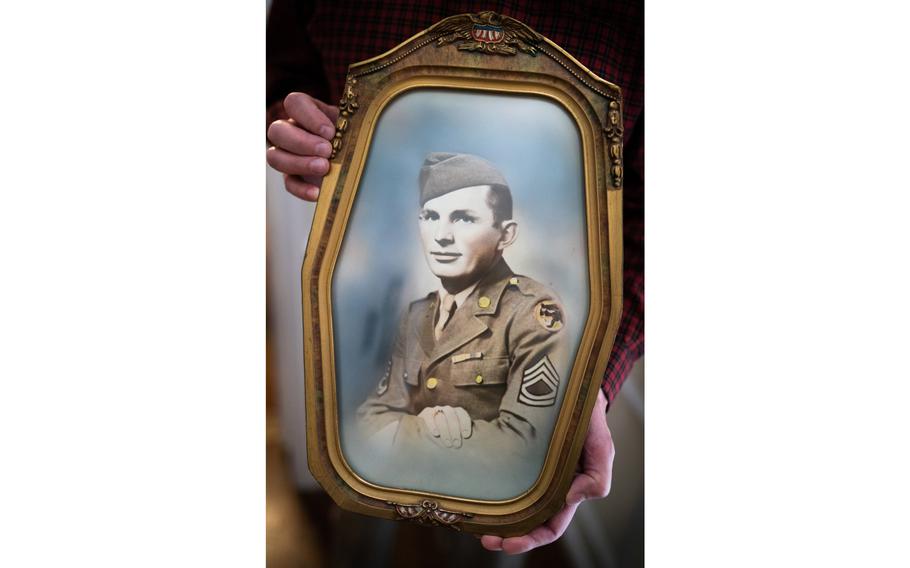 Charles Simpson, holds a photo of his uncle, James. Simpson didn’t know much about how James died until January when he read an article in The Washington Post.