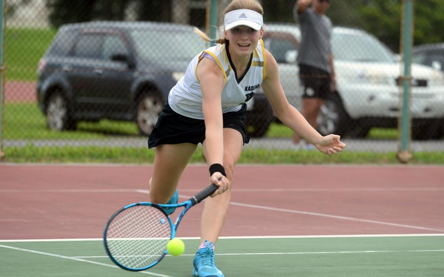 Kadena's Brooke Brewer hits a groundstroke during Tuesday's Okinawa tennis singles matches. Brewer lost to Kubasaki's Lan Legros 6-1.