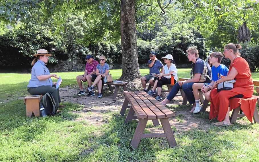 Interpretive park ranger Amy King leads a free tour of Harpers Ferry’s historic town center. 