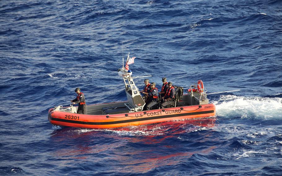 A small boat crew trains at sea