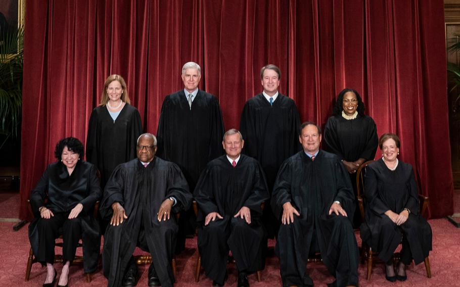 Members of the Supreme Court sit for a group photo on Capitol Hill in October 2022. 