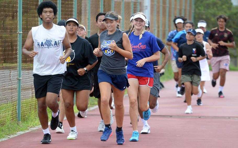 Seniors Steven Ryan, left, and Sydney Pontious are two veterans returning to Kadena's tennis team.