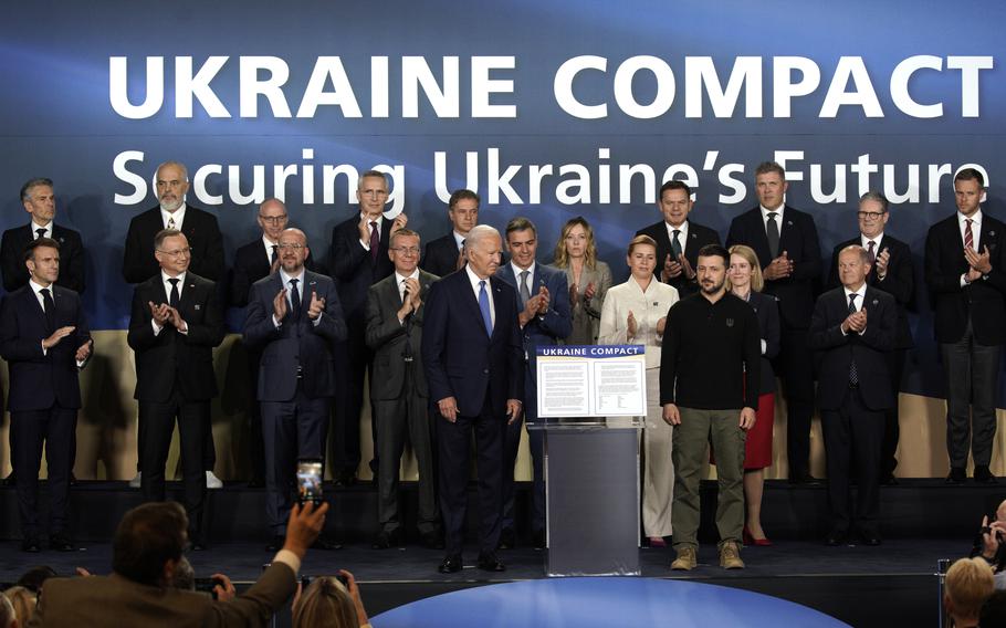 U.S. President Joe Biden, with Ukrainian President Volodymyr Zelenskyy, hosts an event on the Ukraine Compact during the 75th NATO Summit in Washington, D.C., on July 11, 2024.