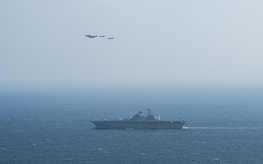 Six F-35B Lightning II fighter fighter jet fly over USS America in the Philippine Sea on Monday, Feb. 17, 2025. 