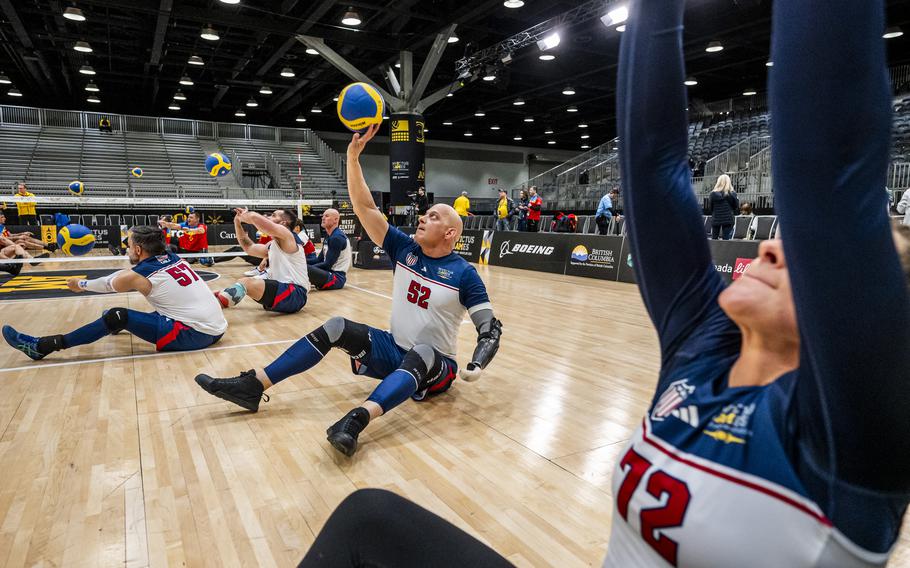 A competitor practices volley passes