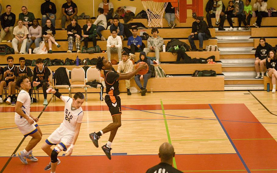 Spangdahlem’s Makario Drummond leaps for a layup during a DODEA-Europe Division III basketball semifinal game Feb. 17, 2023, in Baumholder, Germany.