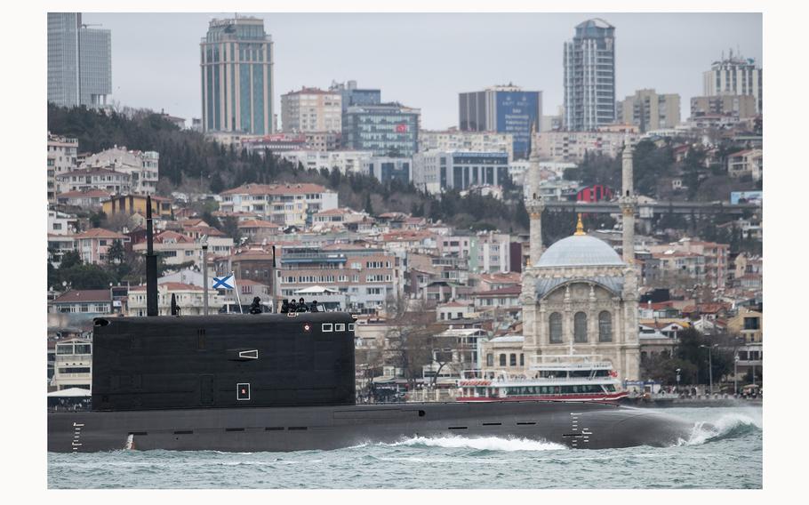 Russian sailors stand on the bridge of the Russian Navy’s Kilo-class submarine Rostov-na-Donu B-237 as it transits the Bosphorus Strait en route to the Black Sea on Feb. 13, 2022, in Istanbul, Turkey. 