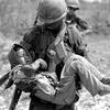 HED: Soldier and child, 1967

South Vietnam, April, 1967:  Sgt. George Edmonds carries a wounded Vietnamese child to a helicopter on a patrol by the U.S. Army's 199th Light Infantry Brigade in the area of Can Giouc. The boy had been hit in the hand by an errant M-16 round during fighting between American and Viet Cong troops.

Looking for Stars and Stripes’ coverage of the Vietnam War? Subscribe to Stars and Stripes’ historic newspaper archive! We have digitized our 1948-1999 European and Pacific editions, as well as several of our WWII editions and made them available online through https://starsandstripes.newspaperarchive.com/

META TAGS: Vietnam War; U.S. Army; 199th Light Infantry Brigade; combat; casualties; civilian casualties; cost of war