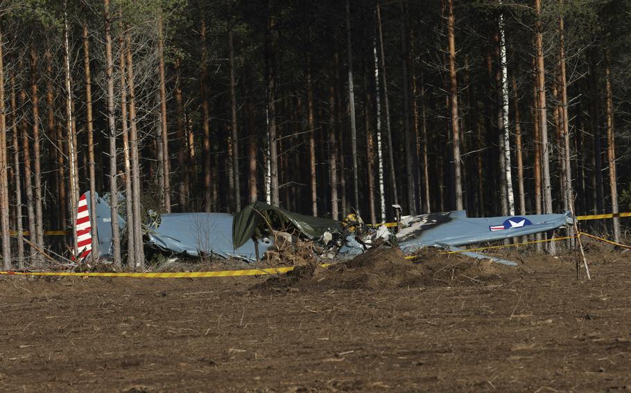 A World War II-era airplane is seen after crashing