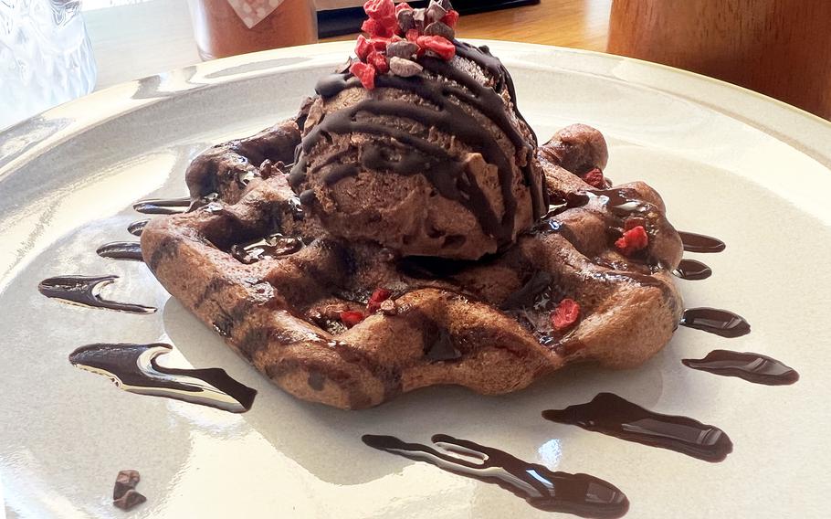 The chocolate special, a chocolate rice waffle topped with chocolate vegan ice cream, chocolate sauce, organic cacao nibs and freeze-dried raspberries at Marugoto Vegan Dining Asakusa in Tokyo. 
