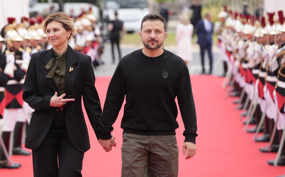 Ukrainian President Volodymyr Zelenskyy and his wife Olena Zelenska, arrive at the international ceremony at Omaha Beach, Thursday, June 6, 2024 in Normandy. Normandy is hosting various events to officially commemorate the 80th anniversary of the D-Day landings that took place on June 6, 1944. 