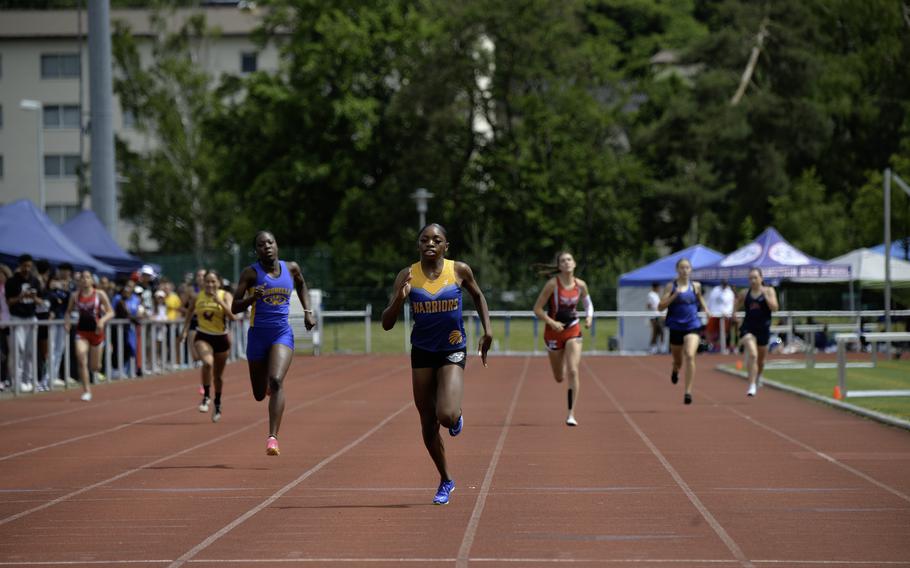 Makiah Parker, a senior at Wiesbaden High School, crosses the finish line with a commanding lead to win the girls 400-meter dash at the 2024 DODEA European Championships at Kaiserslautern High School in Kaiserslautern, Germany, on May 24, 2024.