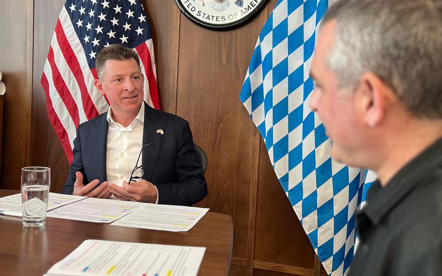 Andreas Kreuzer, who co-hosts the "Better in Bavaria" podcast produced by U.S. Army Garrison Bavaria, interviews diplomat Timothy Liston at the U.S. Consulate in Munich on April 9, 2024.